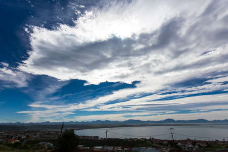 Gradients and different textures of clouds over the ocean.の写真素材
