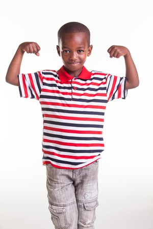 Little boy dressed in stripes and denimの写真素材