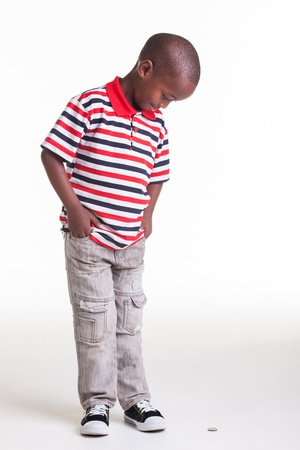 Little boy dressed in stripes and denimの写真素材