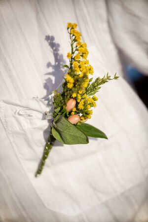 The flower of the groom are yellow with orange pips.の写真素材