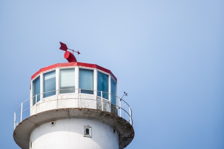 A  small light house on the top of the mountain の写真素材