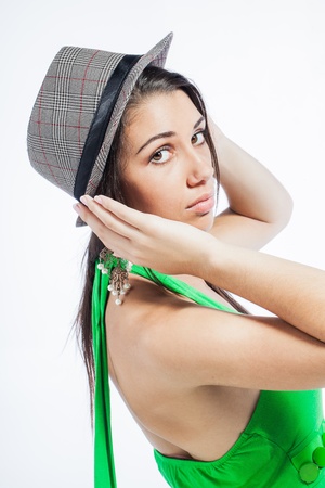 Beautiful upcoming model dressed in a playful, bright coloured, green dress.の写真素材