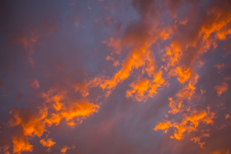 Blue, orange and pink skies with different gradients.の写真素材