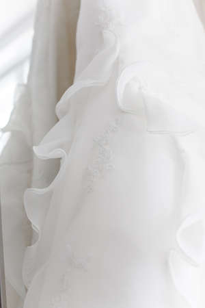 A close- up photograph of a wedding dress.の写真素材
