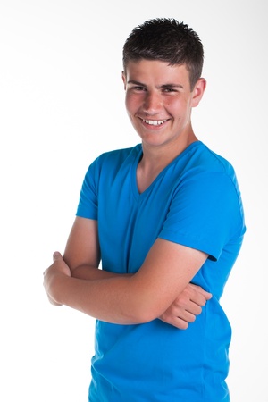 A young teenage boy being photographed in a studio.の写真素材