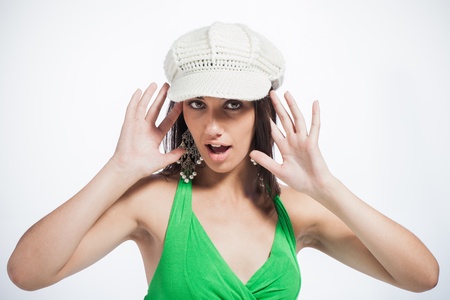 Beautiful upcoming model dressed in a playful, bright coloured, green dress.の写真素材