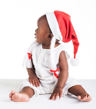 A little African girl, dressed as Ms. Christmas Astrix.の写真素材