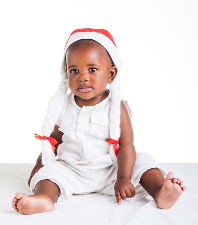 A little African girl, dressed as Ms. Christmas Astrix.の写真素材