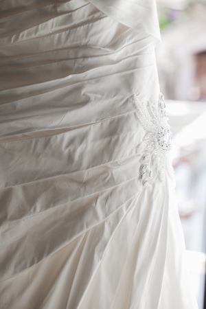 The center cut of the wedding dress of the bride.の写真素材