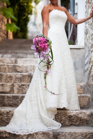 A bride in her gown only minites before her wedding.の写真素材