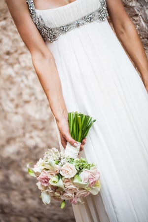 The center cut of the wedding dress of the bride.の写真素材