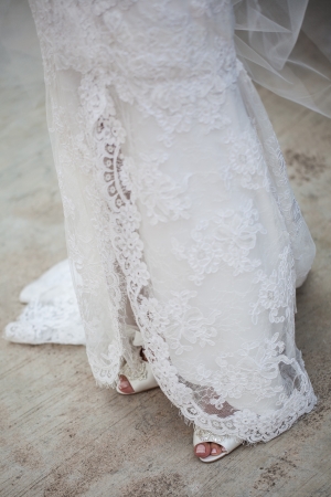 The bottom cut of the wedding dress of the bride.の写真素材