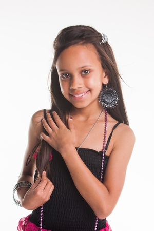 A Indian girl in the studio being photographed in different outfits.の写真素材