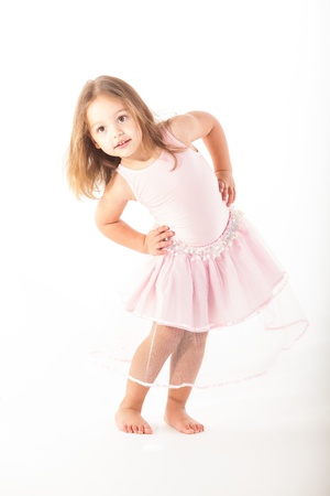 A little girl twirls and turns in her fairy outfit.の写真素材