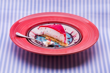 A stripe backdrop with a nice piece of jello tart.の写真素材