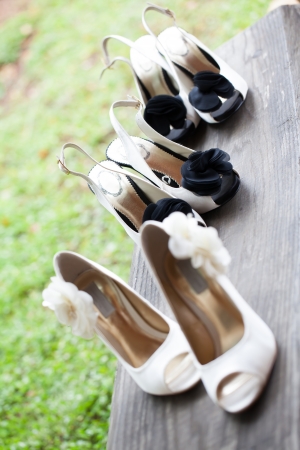 The beautiful shoes of the bride with flowers on the side.の写真素材