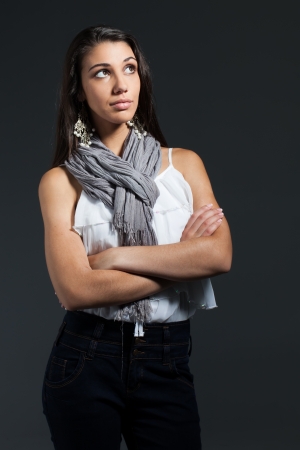 A young model with long brown hair are being photographed in a studio.の写真素材