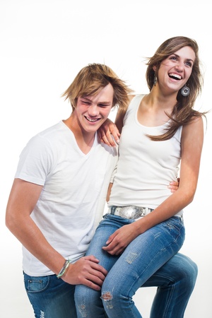 A young high school boy and his girlfriend being photographed.の写真素材
