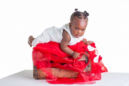 An 8 months old baby dressed to explore Christmas.の写真素材