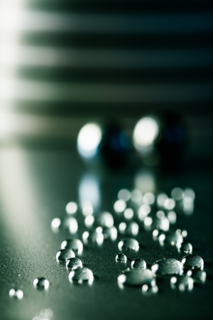 Glycerin drops in different sorts, sizes and shapes being photographed.の写真素材