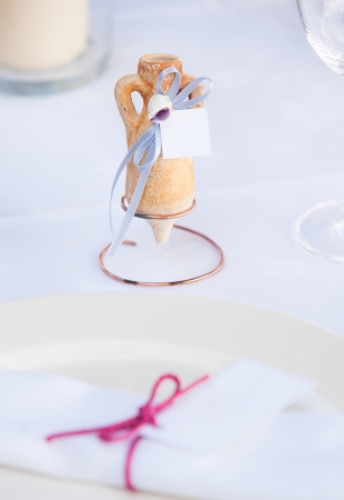 soft delicate table decorations for name cards/messages  by the platesの写真素材