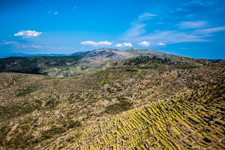 a birds eye view on a sunny day of the ruins of agriculture on the island of Hvar in Croatiaの写真素材