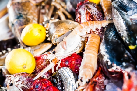 a bright colorful close-up on the catch of the day by a local fisher marketの写真素材