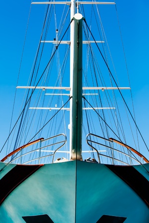 a cropped image of big sail boats bow and halyards taken from a birds-eye-view