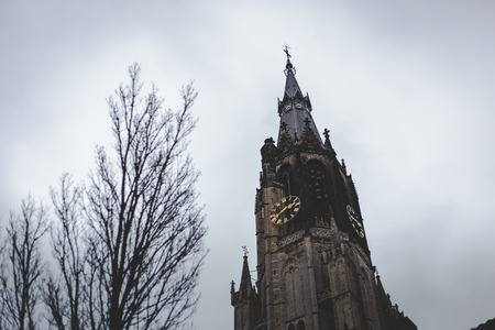 Delft, Netherlands - January 6 2019: Tower of the Nieuwe Kerk, New Church, in the old city center of Delft.の写真素材