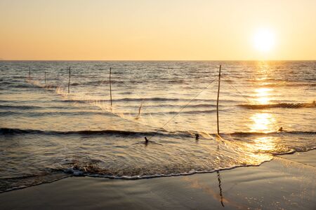 The fisherman's net and sunsetの写真素材