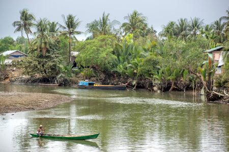 Duya/Myanmar-24.02.2017:The boat with fisherman in small fisherman village in Myanmarの写真素材
