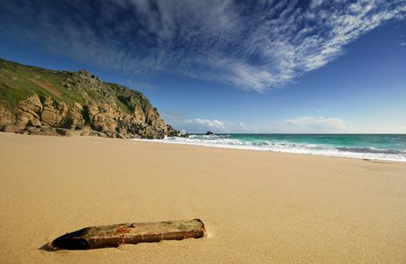 Driftwood on a pristine Cornish beach.の写真素材