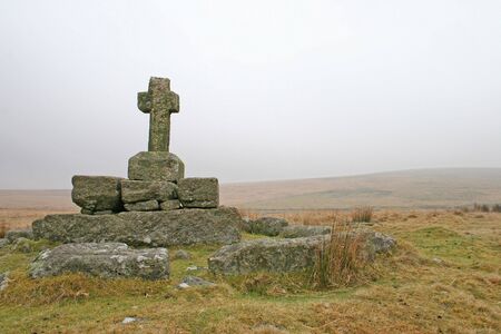 Childes tomb on high Dartmoor is a place surrounded by legend and myth, it is situated in a desolate area of the moor just to the south east of Foxtor mires and just north of Fox Tor. Legend has it that the original tomb was that of Childe the Hunter, whoの写真素材