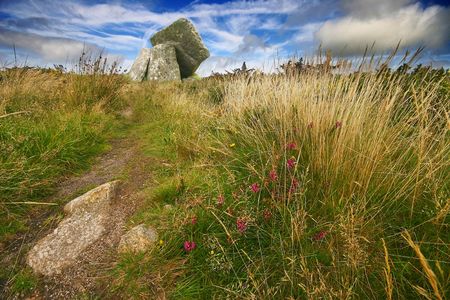 Mulfra Quoit is a well preserved example of a megalithic tomb or dolmen, the Western part of Cornwall in the UK, where Mulfra is sited is dotted with ruined ancient settlements and tombs. の写真素材