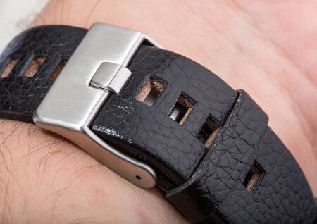Latch of watch on handの写真素材