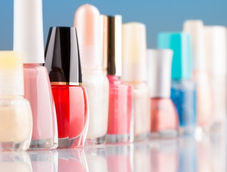 Colorful nail polish in a rowの写真素材