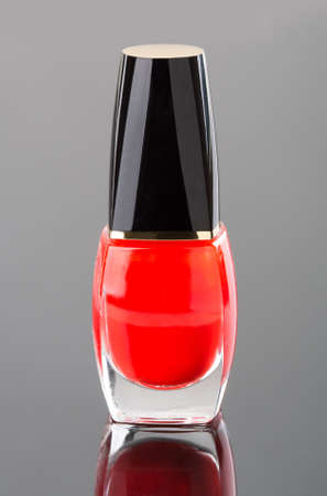 Red nail polish on mirrorの写真素材