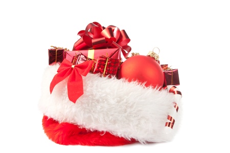 Christmas hat full of red ornaments. Isolated on whiteの写真素材