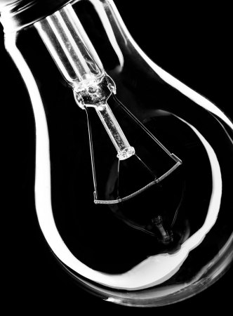 Close-up of electrical bulb. Isolated on blackの写真素材