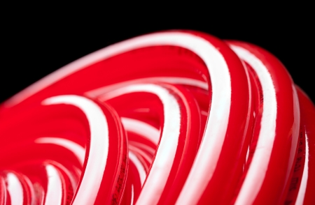 Close-up view of long red water pipeの写真素材