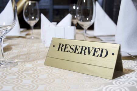 Reserved sign on the tableの写真素材