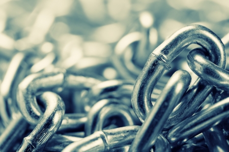 Closeup of industrial chains. Toned