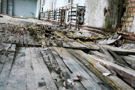 Abandoned building interior. Damaged floorの写真素材