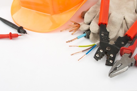 Electrician's tools. Hardhat, pliers, cables, cutter, etc.の写真素材