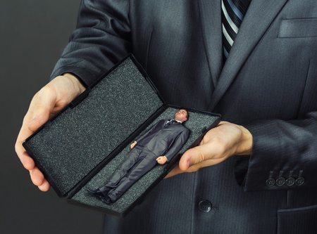 Business present - small businessman in box