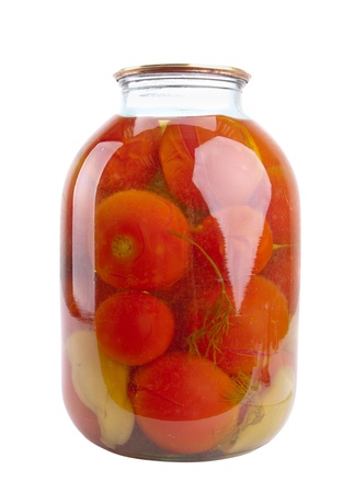 Canned tomatoes in glass jars isolated on whiteの写真素材