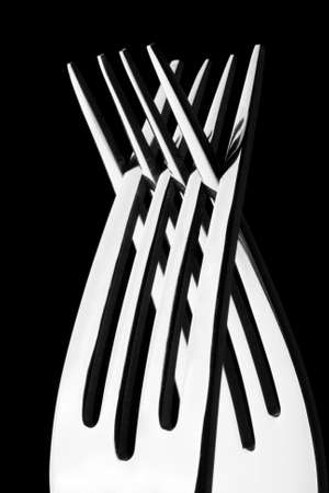 Two crossed silver forks. In B/Wの写真素材