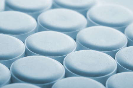 Many medical pills. Toned in blueの写真素材