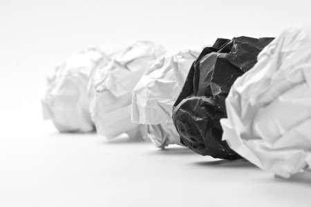 Concept of crumpled paper balls on whiteの写真素材