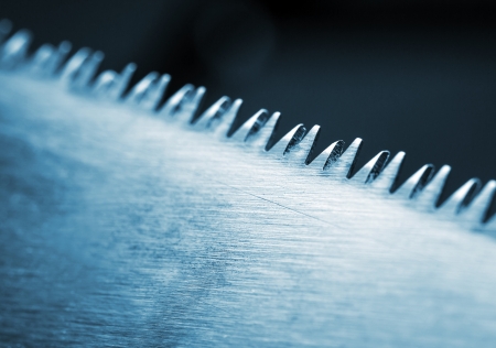 Closeup of saw blade. Toned in blueの写真素材